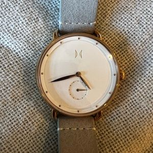 MVMT gold and light blue watch